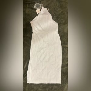 Brand new with tags medium Rihoas dress comes with a extra pearl strap!